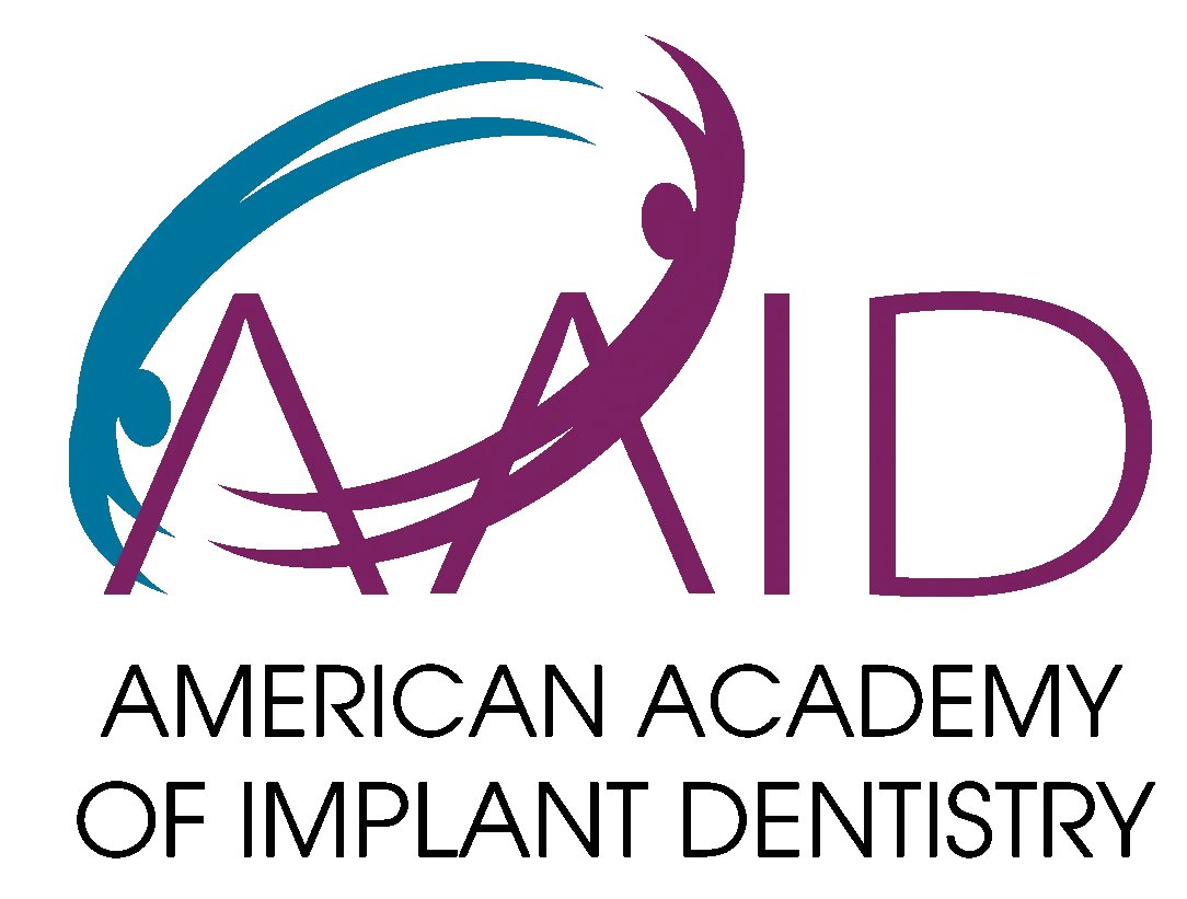 American Academy of Implant Dentistry Logo - Volterra Dental Comprehensive and Aesthetic Dentistryconde Logo of the American Academy of Implant Dentistry (AAID), featuring stylized purple initials with a blue and purple circular design symbolizing care and collaboration. - Volterra Dental Comprehensive and Aesthetic Dentistry